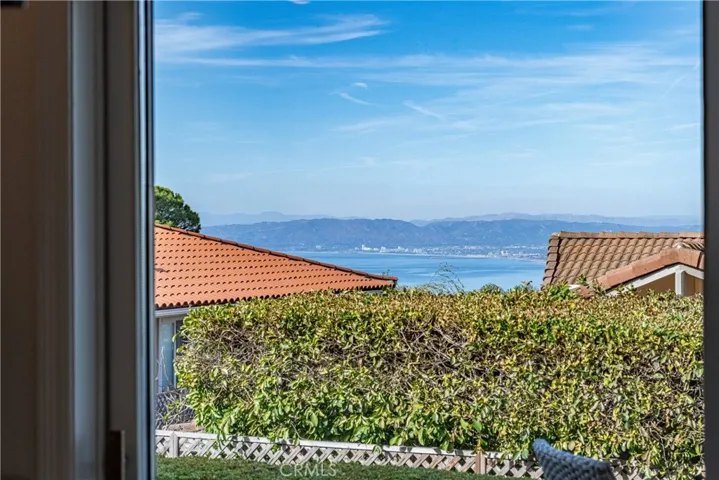 Queens Necklace views from the formal dining room, kitchen and family room!