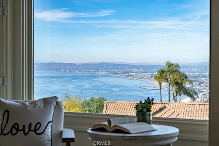 The Queens Necklace view from the primary suite are sweeping! There are also views from the formal dining room, kitchen, and family room.