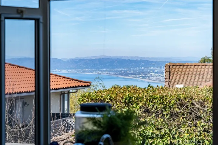 Queens Necklace views from the formal dining room, kitchen and family room!