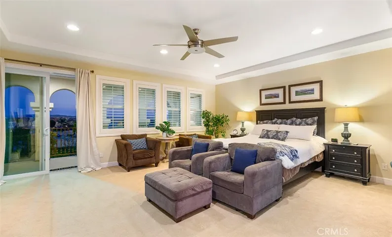 Primary Bedroom with Balcony & Views