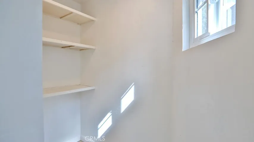 Upstairs bedroom walk in closet