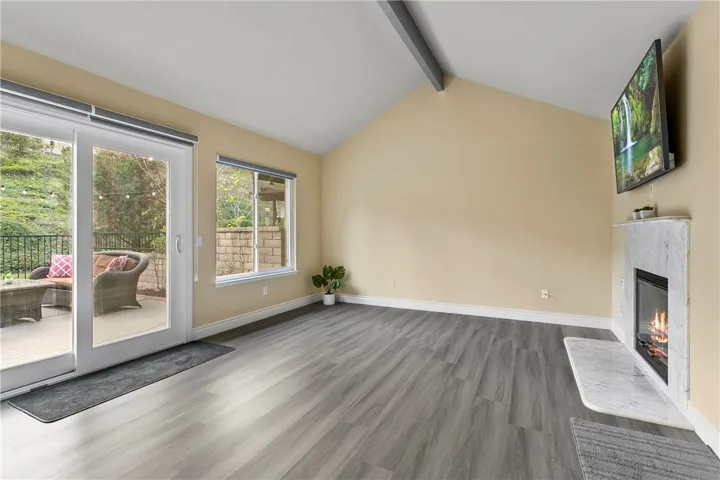Living Room with wonder flow to out backyard with views of greenery.