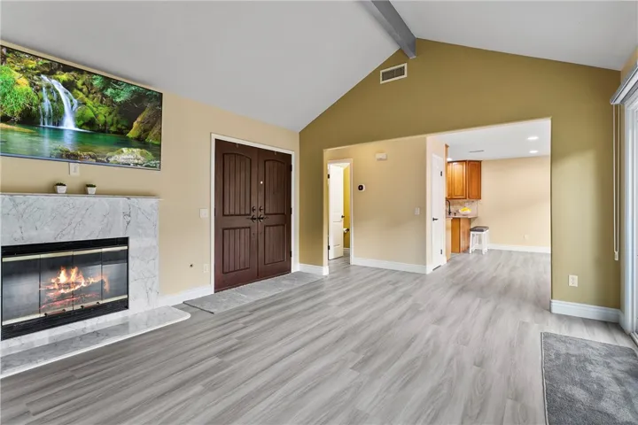 Open with nice flow to kitchen and dining area.