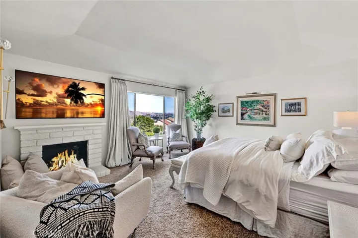 Primary suite with romantic fireplace.