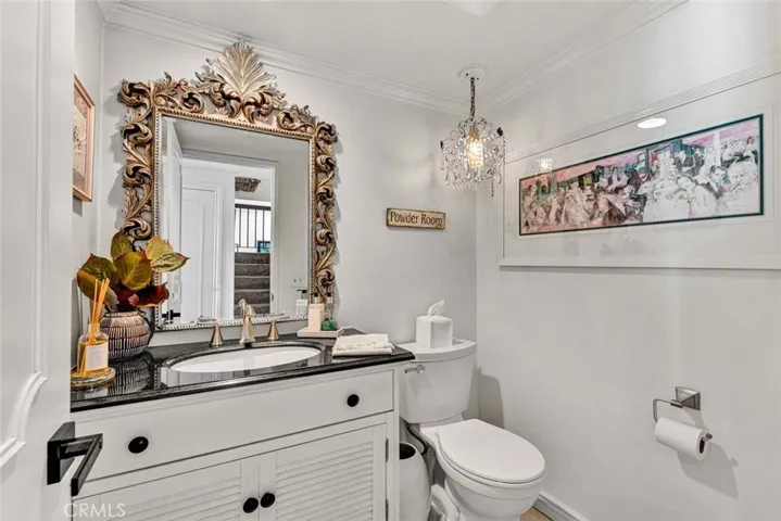 Bathroom #1: Powder room.
