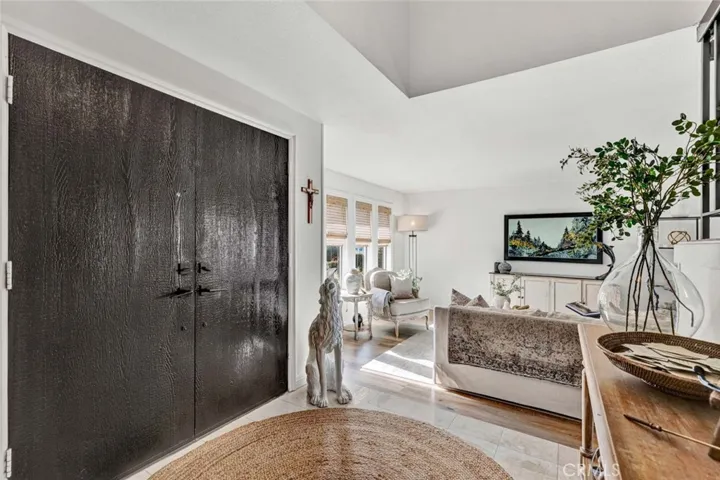 Double door entry, foyer and living room