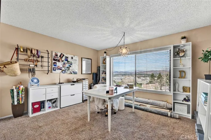 Bedroom #3: currently being used as a hobby room. Fabulous views!