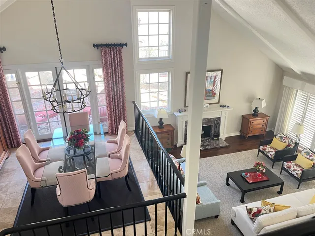 View of living/dining rooms from loft area