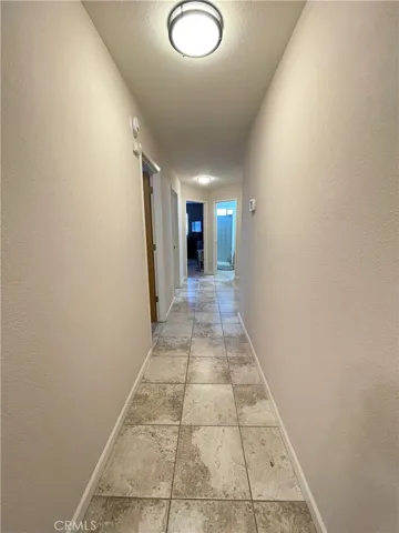 Hallway to bedrooms and bathroom