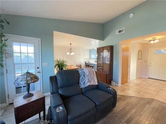 living room to dining area and kitchen