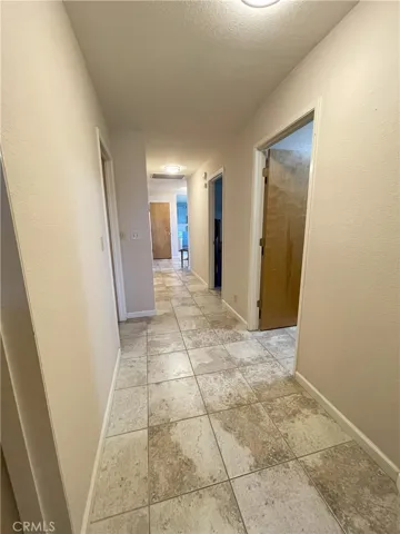 Hallway to Livingroom and kitchen area