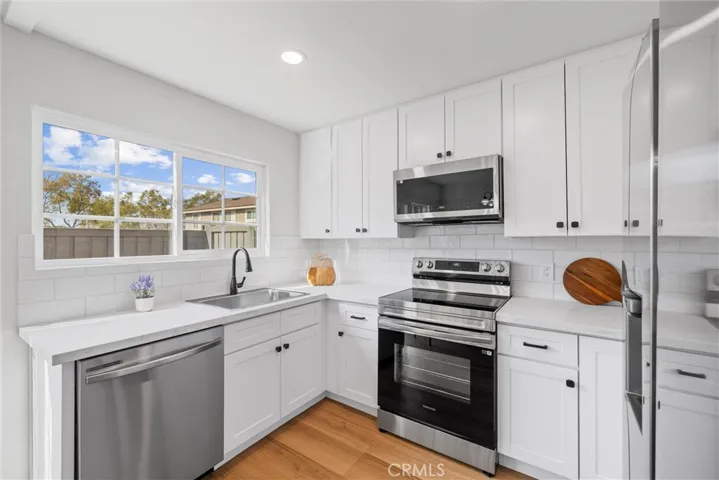 All new Kitchen Cabinets & Appliances + New window