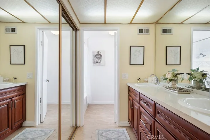 Ensuite with dual sinks and 2nd Closet
