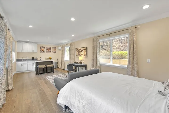 Sunroom with bedroom and bathroom