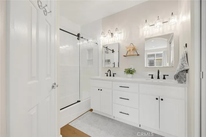 Walk in shower tiled floor to ceiling