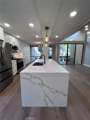 Waterfall center island with bar seating.