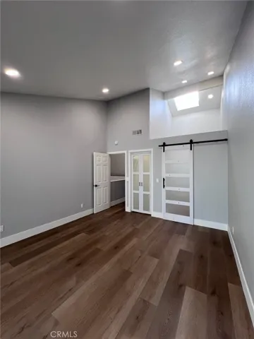 Another view of the primary bedroom with deck.