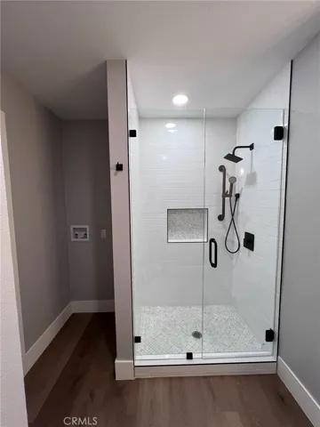 Walk-in shower at the second primary bathroom.