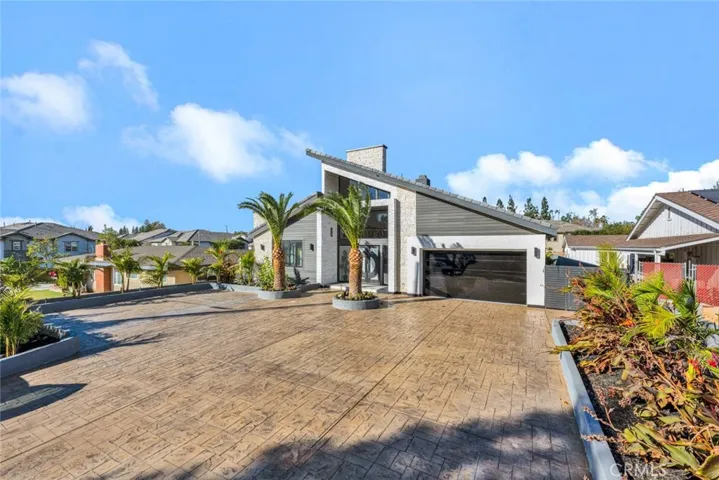Giant Stained Concrete Driveway can Park Multiple Cars/RV's. Tropical Landscaping, Including Full-Size Palm Trees
