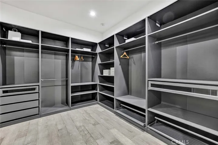 Primary suite Walk-In Closet with Custom Organizers