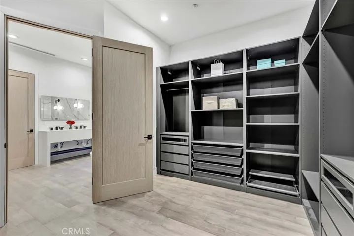 Custom Organized Walk-In Closet for the Primary Suite