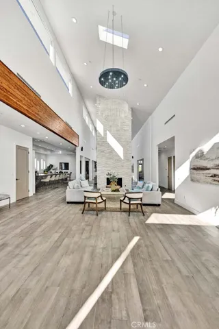 Wood Laminate Flooring and LED Recessed Lighting Throughout