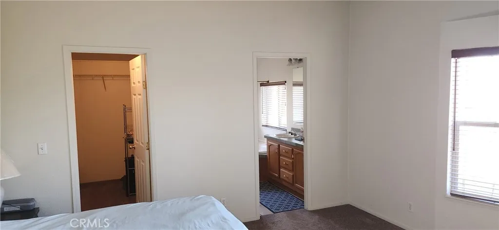 Main bedroom with walkin closet.
