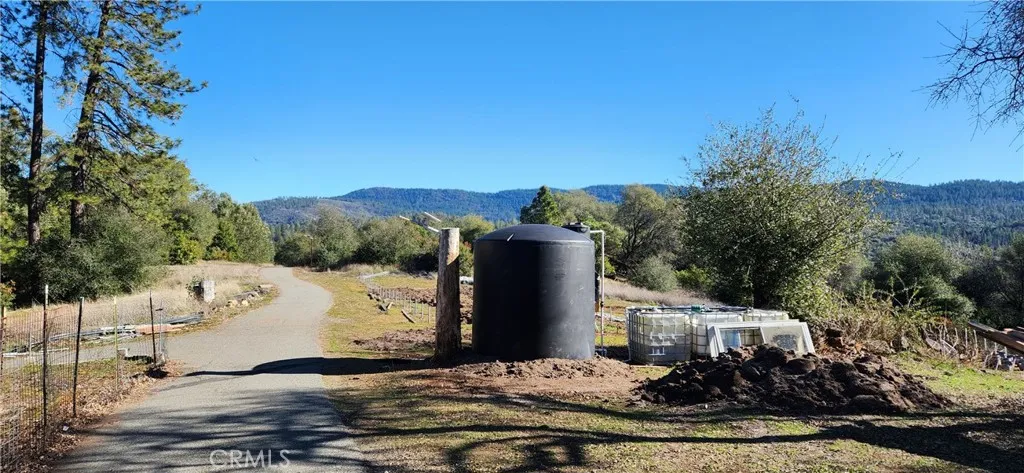 2600 gal Water storage and 220v and 110v Yard Power.