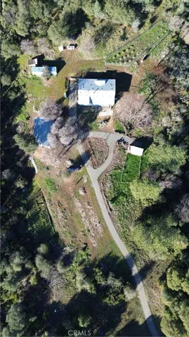 Long paved driveway all the way from the gate.