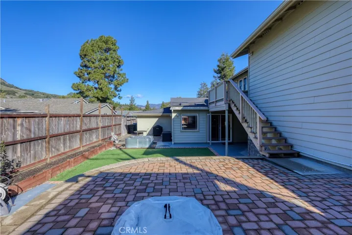 Stairs from deck off primary bedroom to back yardupper