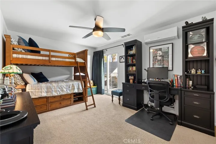 Upstairs Bedroom with slider.
