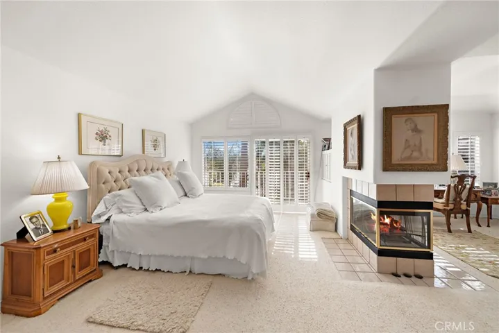 Primary bedroom suite with lounging area
