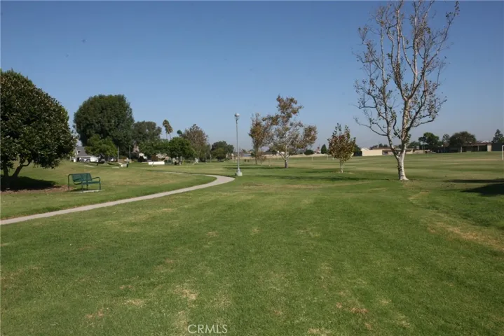 Enjoy 21 acres of private parkland with walking paths