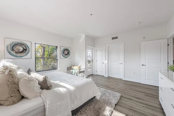 Primary suite has 2 nice sized closets plus a door to balcony.