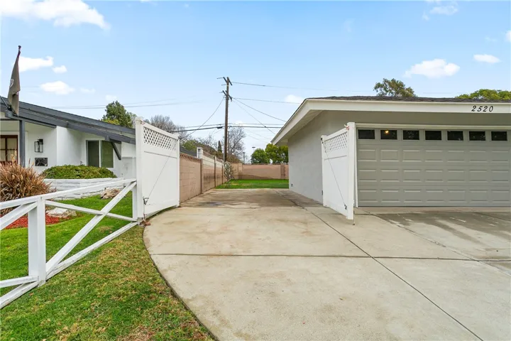 RV access on the side of garage, double gates