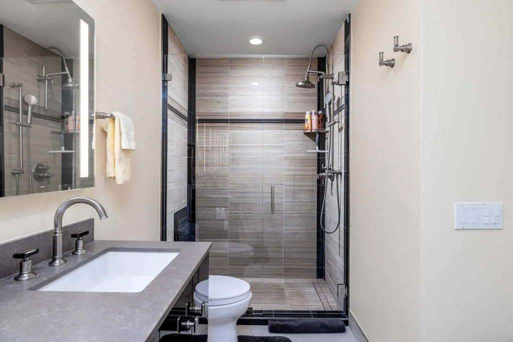 26 A stunning bathroom featuring a glass