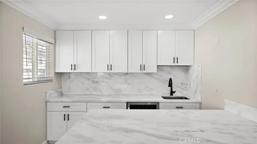 Wet Bar with under cabinets LED lights under cabinets, beverage/Wine Cooler and bar counter.