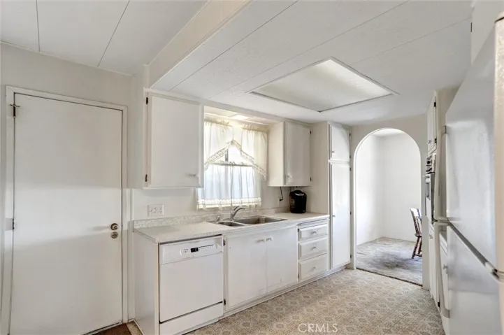 Kitchen area with access to the back porch area