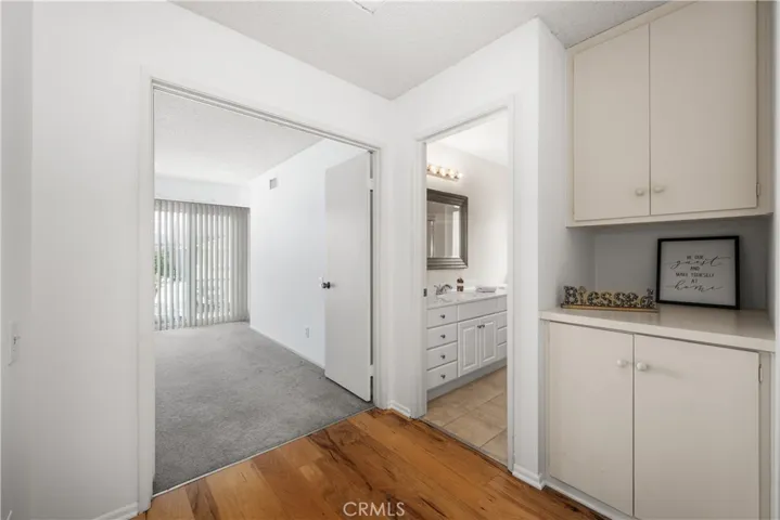 landing/hall upstairs with storage cabinets