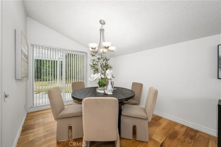 Dining room off kitchen with a view of the back yard