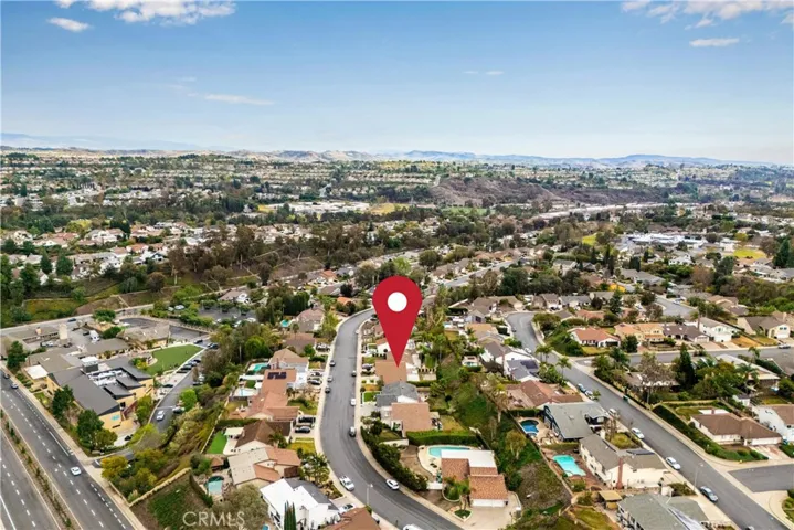 Red marker shows location of house