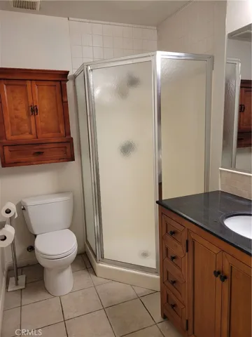Main floor bathroom #1, upgraded tiled floors, corrian counter tops