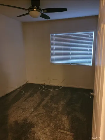 Bedroom #3 with, newly installed carpet floors, ceiling fans/lights, horizontal blinds