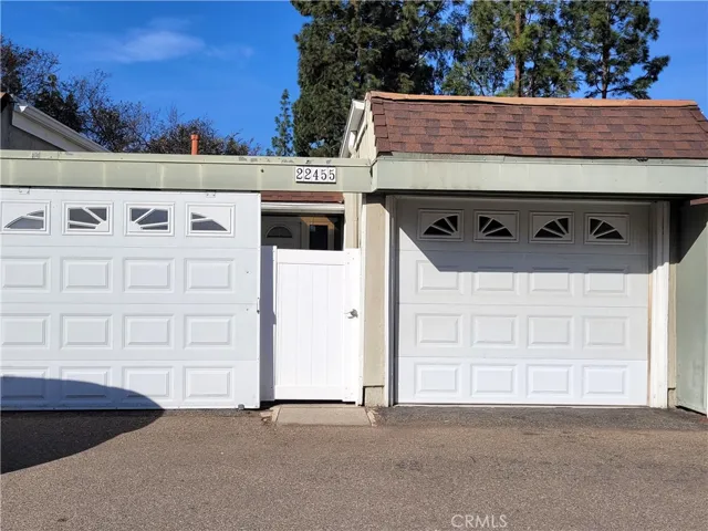 Gated entry to main level, Carport and 1 Car attached garage with auto opener