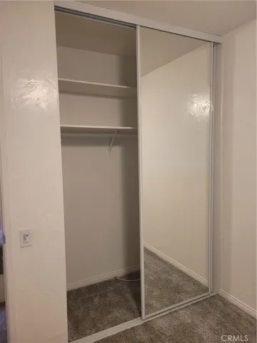 Mirrored wardrobe doors at bedroom #3 at lower level