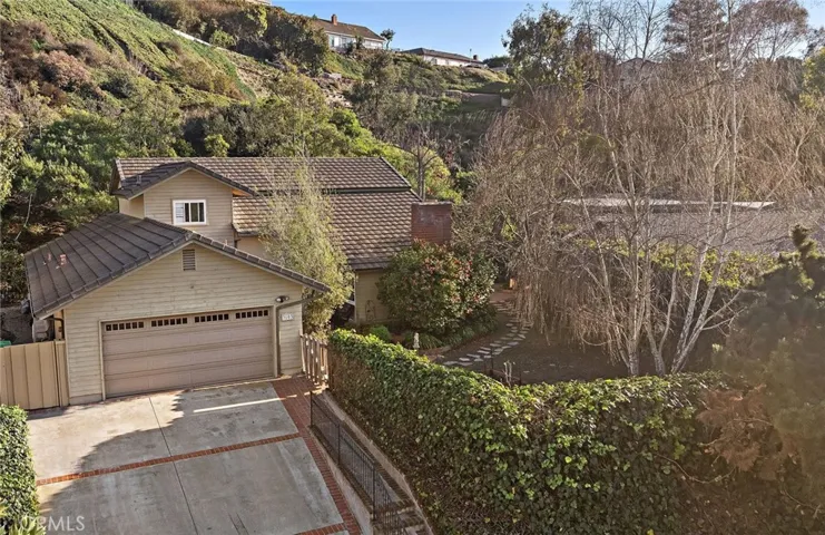 Frontage features ample parking for up to 6 cars and a large private front yard.
