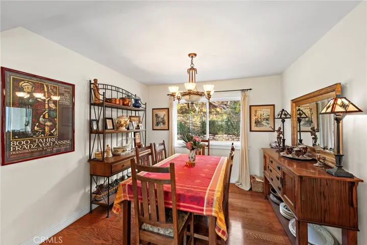 Formal dining room centrally located, adjacent to kitchen and living areas