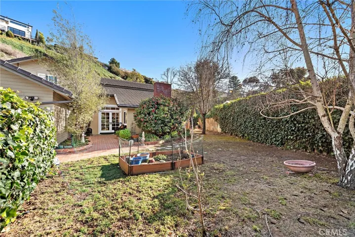 Sizeable private front yard wraps around to rear yard.
