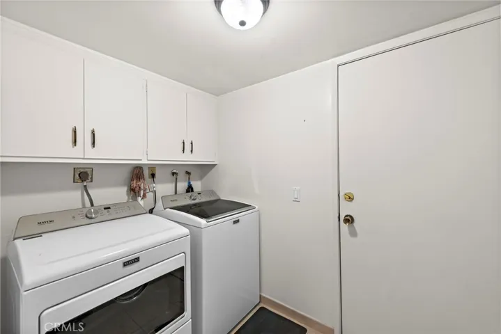 Dedicated laundry room on main floor just off the direct access 2-car garage