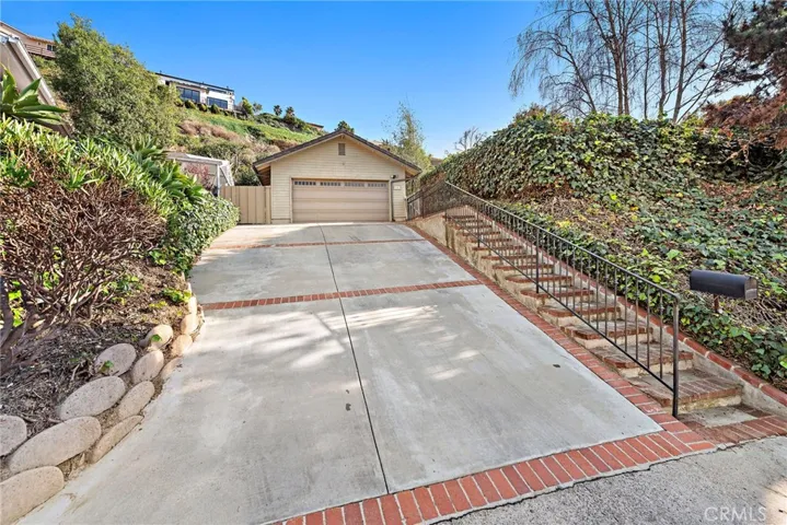 Sizeable driveway with parking for up to 6 vehicles (2 in garage and 4+ in driveway)